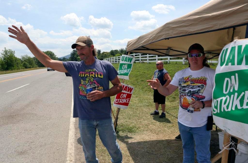 Workers continued to walk strike lines at Volvo Trucks North America entrances Friday.